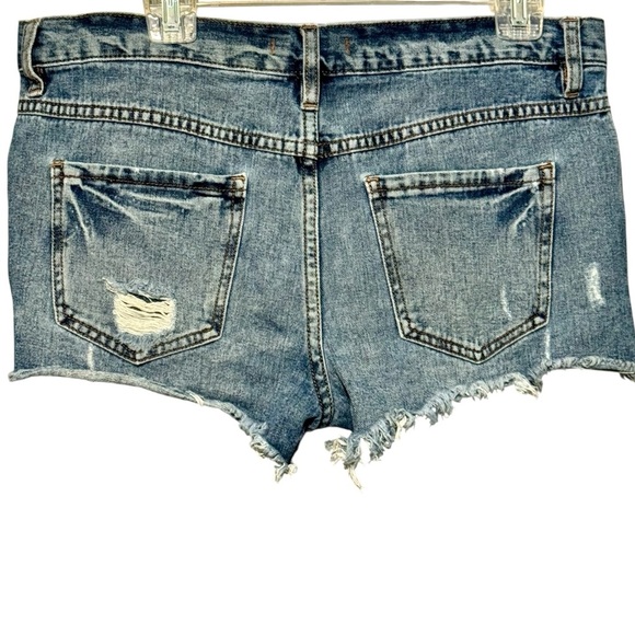 Free People Distressed High Rise Step Hem Button Fly Cutoff Frayed Hem Shorts - Picture 4 of 9